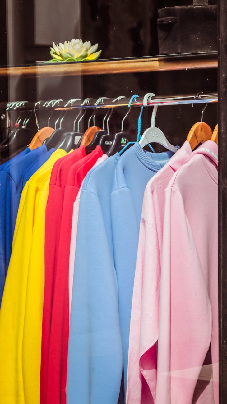colorful clothes on hangers in boutique